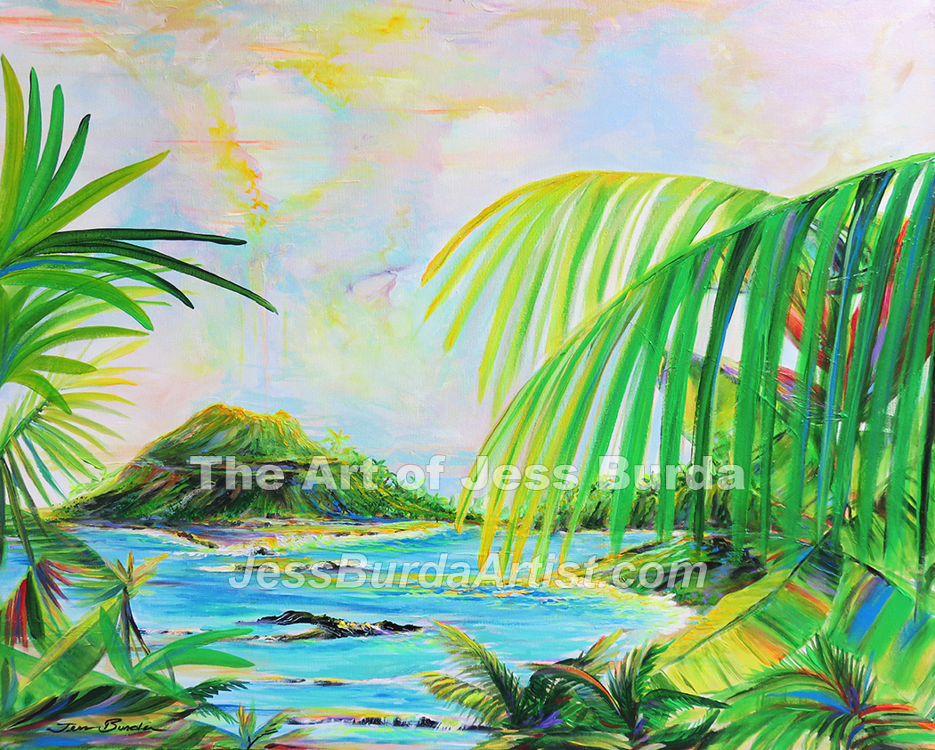 Volcano between palm leaves across cove