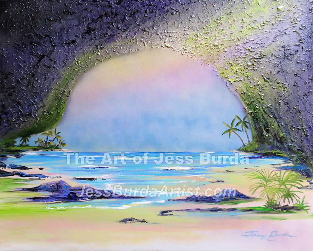 View of ocean from inside cave, light shining through